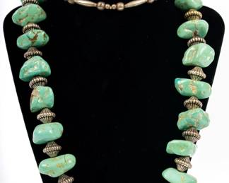 https://www.liveauctioneers.com/item/207340962_navajo-sterling-silver-chunky-turquoise-necklace