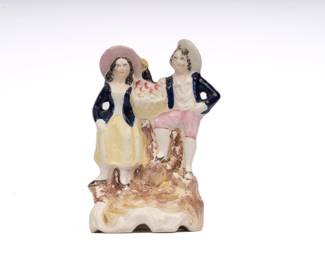 https://www.liveauctioneers.com/item/207340845_early-staffordshire-man-and-woman-grouping-figure