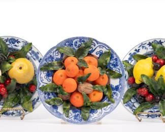 https://www.liveauctioneers.com/item/207340912_christine-viennet-set-of-3-trompe-l-oeil-fruit-porcelain-epicurean-plates