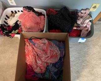 bins and boxes full of scarves, ballcaps