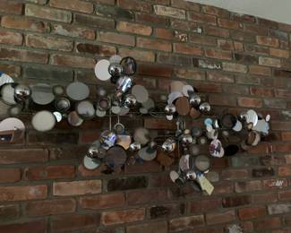 signed Jere wall sculpture