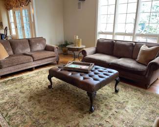 Century end tables,
Leather ottoman, 49” X 3 ft X 18 1/2 H
two couches