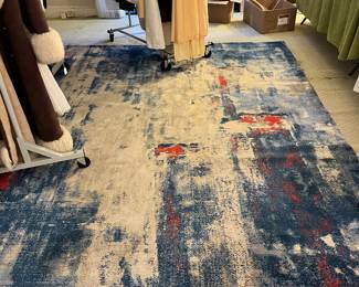 Nourison rug. Estimated dimensions are 7‘ x 9 feet