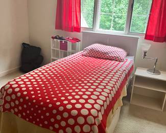 Twin bed with two large storage drawers underneath.