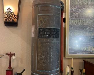 Brass fire extinguisher one of two