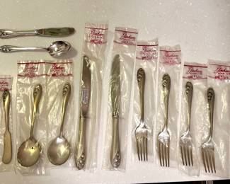 Unopened Sterling Gorham - 2 knives, 2 lg. forks, 2 sm. forks, 2 soup spoons, butter knife, sugar spoon, cheese knife