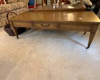 Vintage coffee table with rollers