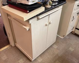 Rolling cabinet. Will make a great island in your kitchen!