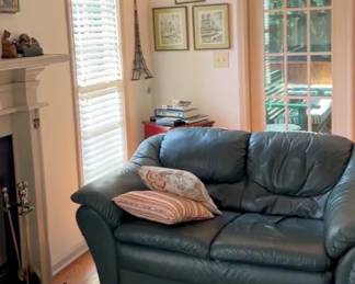 Blue-green high-end vinyl loveseats. Everything for sale.