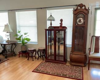 Lighted curio cabinet, oriental marble table. Grandfather clock needs work have sold