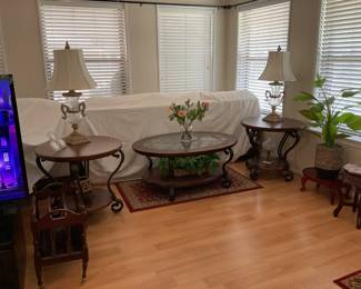 Coffee table and end tables with brass/glass lamps all have sold