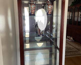 Lighted curio cabinet with oriental hand painted vases are all still available