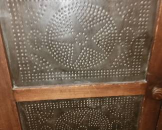 Punched tin detail on pie safe