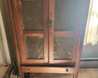 Pie safe with punched tin doors