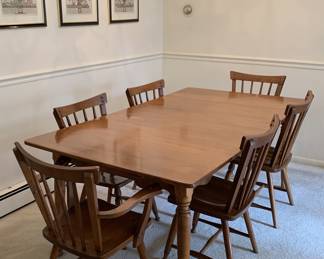 Beautiful wood dining table/six chairs/one leaf. Haven’t found the table pads yet.