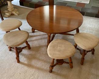 Coffee height table and game playing chairs. Perfect for the children or adults playing board games. Chairs can easily be recovered.