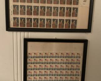 Framed sheets of contemporary US stamps.
