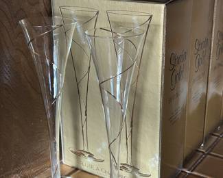 Gorgeous Champagne flutes. New in box. Strata Gold By Colony.