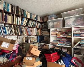 Thousands of books in multiple rooms.