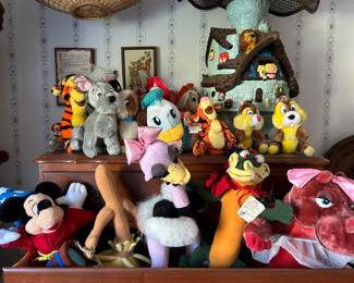 Dozens of Disney plush and DVDs.