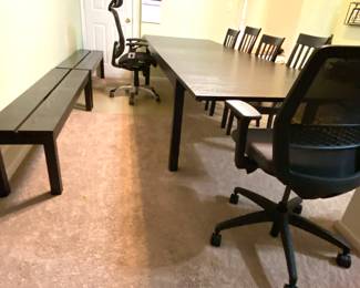 Conference table and chairs with bench seats