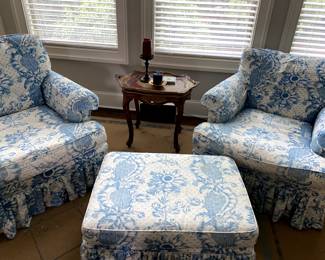 A sitting chairs and ottoman