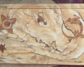 Carved Southwest art sandstone tabletop.