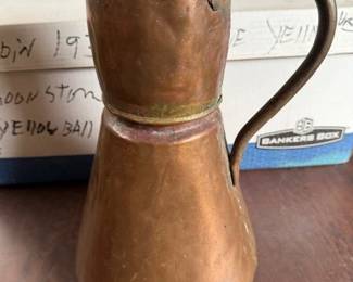 Copper pitcher.
