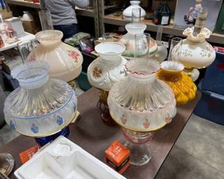 Aladdin oil lamps. Some have Aladdin electric burners. Link: https://modestlambestatesales.hibid.com/