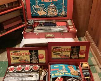 Three Erector sets in metal cases , two in wood boxes