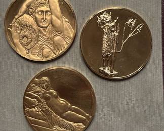 these are made of 24k gold over sterling silver and each weighs 2 ounces, made by Franklin mint. We have numerous lots of these coins / medallions in this auction. They commemorate great artworks of the world.
