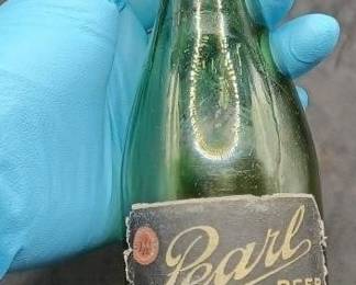 rare old green circa 1890-1910 blob top beer bottle with Pearl Beer label.