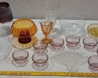 21 piece lot of antique glassware, all on table. Empoli amber italian venetian glass compote, Old aqua Davidson berry dish, 8pc Anchor Hocking Savannah amethyst custard cups, Davidson antique bon bon dish, antique pressed glass fan tray, Jeanette 1930s 40s Iris and Herringbone large footed vase, Fenton topaz footed bowl, lots more.