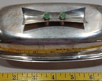 Signed TOWLE Sterling 53 (pattern number). Piece is circa 1930s. Art deco design with 2 jade / jadite green "jewels" on the handle. Weighs 198 gram which is approximately 7 ounces. . 92.5% pure silver.