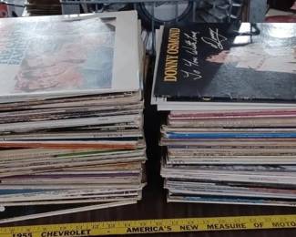 Several huge lots of 45rpm, 78rpm, and 33rpm records in this auction as well as CDs and 8 track tapes, lots of music.