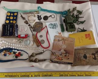 US military navy buttons in original box, old marbles, jewelry, advertising, stag buckle, army toys, fuffalo nickel and silver US walking liberty half dollar no dates, Jim Beam keychain, more. Jeep is marked TIm-mee Toys. 9 new old stock unused US Navy uniform service buttons in the original box, Hygeia Ice Company advertising ice pick, fire extinguisher cigarette lighter, Crumrine stag belt buckle signed on back heavy silver plate on bronze, Not sure what the metal piece marked MacGregor is for but the company made bicycle accessories, Old ephemera Bewleys Best & Malt O Meal advertising pieces and more. Ireland Guitar music first day cover stamp 1979. Old army men toys, old rubber toy knife, costume jewelry.
