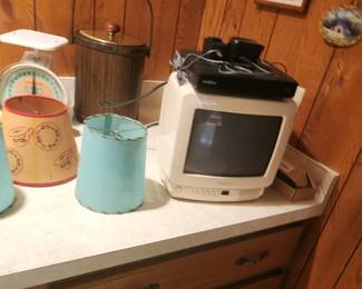 Old retro lampshades and TV