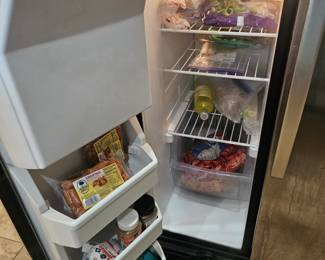 Frozen foods for sale also in stand up freezer in garage