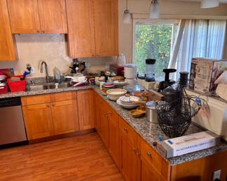 Full kitchen setup — dishes, silverware, gadgets, blenders & more all priced to go.