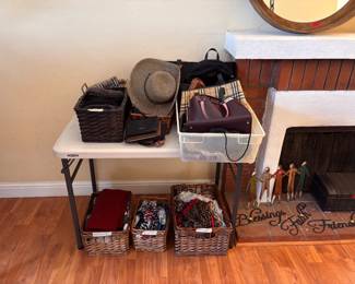 Burberry scarves, Kate Spade bags & cozy layers — fashion finds in every bin.