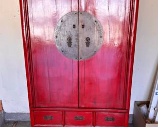 Price: $375
Beautiful red lacquer Asian armoire with large circular brass medallion and six exterior drawers, plus three additional drawers inside. Originally repurposed as a media cabinet — includes discreet holes in the back for cord management and ventilation. Solid wood construction with a rich interior finish and decorative hardware. Works perfectly as a TV cabinet, statement storage piece, or even a home bar.