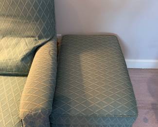 pair of green chairs and ottoman