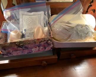 Leather and kid gloves, sachets, garters