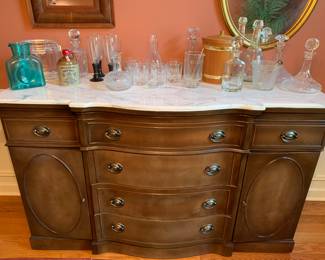 marble top buffet with vintage bar ware
