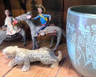 Carved pieces by Delbert Buck (Navajo/Dine); Mexican pottery