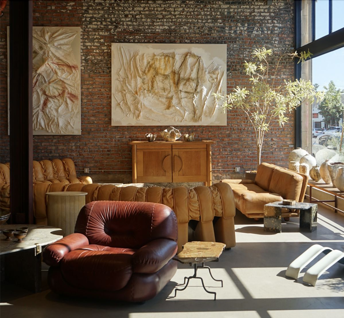 Vintage Leather Seating, Italian Modular Sofa, Mid-Century Credenza, and Art