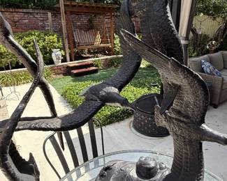 Cast iron bird sculpture
