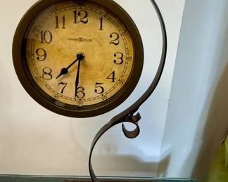 Howard Miller Table Clock - Antique Brushed Brass and Bent Metal Scroll Stand