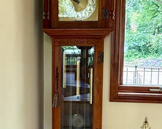 Howard Miller Model 4487 Grandfather Clock with Barwick Moving Phase Dial