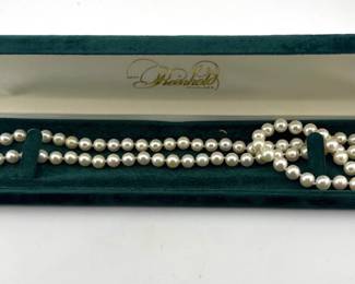 Hand knotted pearl strand with 14kt clasp